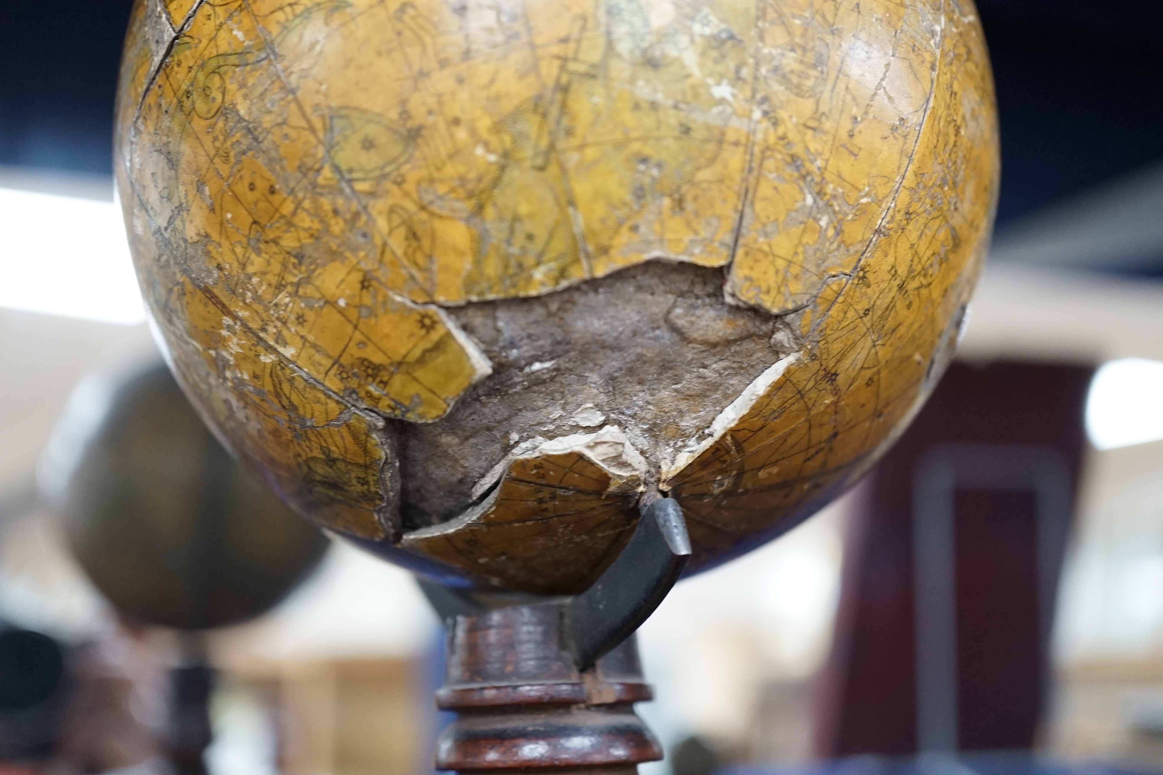 A 19th century 4.5 inch celestial globe on mahogany stand, with distinct maker’s mark reading; ‘Bales? New Celestial Globe 1846’, diameter 11cm. Condition poor, significant damage to the surface and missing sections of p